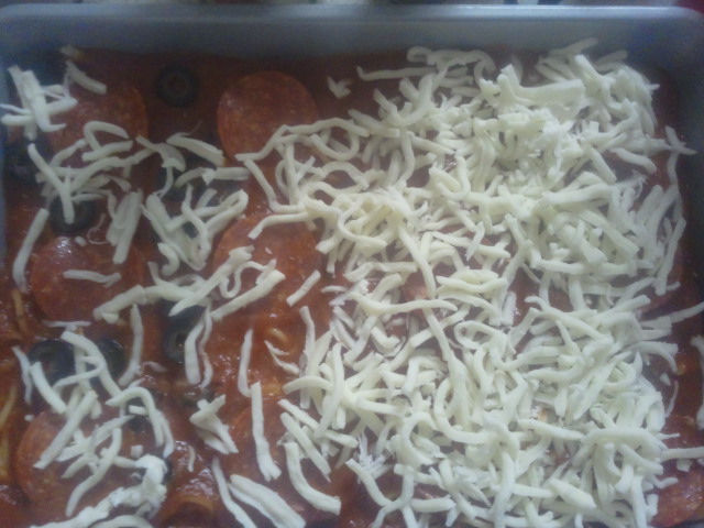 We did one layer of pepperoni under the cheese.
